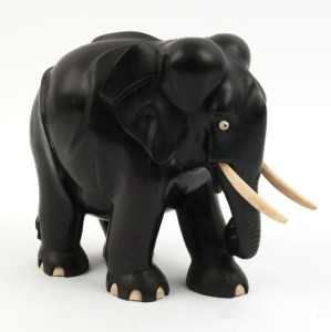A vintage carved ebony elephant statue with bone tusks and toes, early 20th century, ​​​​​​​23cm high