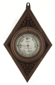 Antique aneroid wall barometer mounted on a diamond shaped carved oak board, with inscription on the dial "PRESENTED BY SAMUEL YATES FOR EXCELLENCY IN HORTICULTURE" 19th century, 44cm high