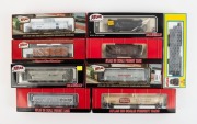 HO GAUGE MODEL RAILWAYS: ATLAS: RSD 4/5 Diesel No.7080 together with rolling stock: 33,000 Gallon Tank Car (Suburban Propane), 3-Bay Cylindrical Hoppers (Indusmin & New York System), 36' Wood Reefer Car (Evansville Packing), Kaolin Tank Car (Anglo-America