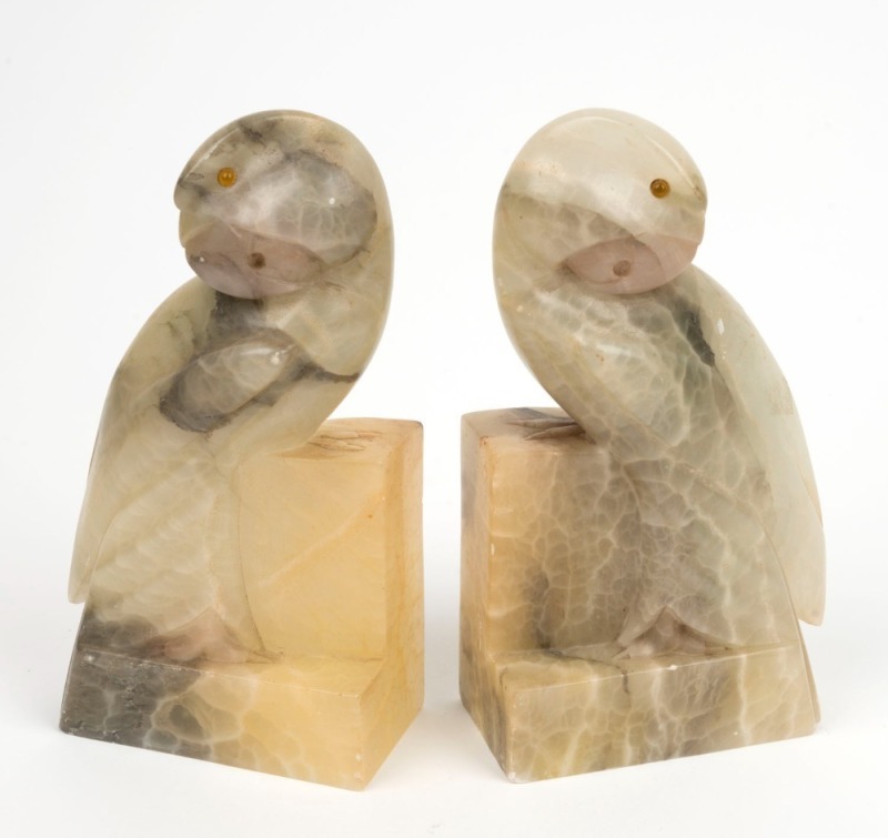 A pair of Art Deco carved marble parrot bookends with glass eyes, circa 1925, ​​​​​​​18cm high