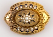 An antique yellow gold brooch with blue enamel decoration, set with seed pearls, mounted with mourning window on reverse, 19th century, ​​​​​​​4.6cm wide, 16.9 grams total