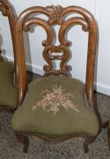 A set of four antique carved walnut salon chairs with French cabriole legs and green floral tapestry upholstery, mid 19th century, 82cm high - 3
