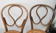 A set of six antique bentwood dining chairs. Note: Some re-caned and some bearing original label "J. & J. Kohn. Austria" - 6