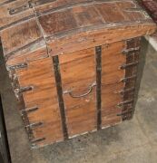 An antique Indo-Portuguese&nbsp;teak domed top dowry chest with iron strapping,&nbsp;19th century, later wheels added, 79cm high, 97cm wide, 56cm deep - 2