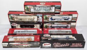 HO SCALE MODEL RAILWAYS: ATLAS: RS-3 Locomotive (Ontario Northland) plus rolling stock, comprising Kaolin Tank Cars (Cyprus & Georgia Kaolin), 6 Bay Cylindrical Hopper (Norfolk and Western), 36' Wood Reefer Car (Kahn's), 17,600 Gallon Corn Syrup Tank Car 