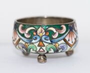 A Russian silver and enamel salt pot, a sterling silver pill box, and three assorted silver mounted vanity jars and bottles, 19th and 20th century, (5 items), ​​​​​​​the largest 13.5cm high - 4
