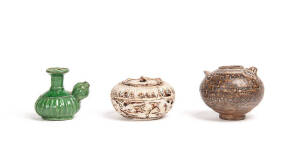 Two Thai covered boxes, 14th/15th century, a small green glazed kendi and a Khmer oil pot in the form of a chicken, 12th century, 9cm, 7.5cm, 8cm and 8cm high