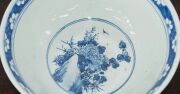A Chinese blue and white porcelain bowl with birds and floral decoration, Qing Dynasty, 19th/20th century, 13cm high, 29cm diameter - 8