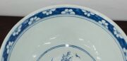 A Chinese blue and white porcelain bowl with birds and floral decoration, Qing Dynasty, 19th/20th century, 13cm high, 29cm diameter - 9