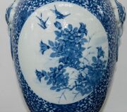 A Chinese ornate blue and white porcelain vase, adorned with vignettes of water scenes, landscapes, birds and blossoms, Guan Xu mark to base, 19th/20th century, 35cm high - 15