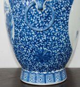 A Chinese ornate blue and white porcelain vase, adorned with vignettes of water scenes, landscapes, birds and blossoms, Guan Xu mark to base, 19th/20th century, 35cm high - 18