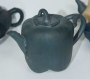 Xizheng ware group of seven assorted Chinese pottery teapots, together with 4 blue cups, (11 items) the largest 11cm high - 8