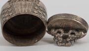 A Chinese silver lidded box of tapering oval form decorated in an archaic style, 19th/20th century, stamped "SILVER", 12cm high, 124 grams - 8