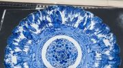 Four blue and white Chinese porcelain platters and four bowls, plus a framed plaque, 20th century, (9 items), ​​​​​​​the plaque 39 x 34cm overall - 5