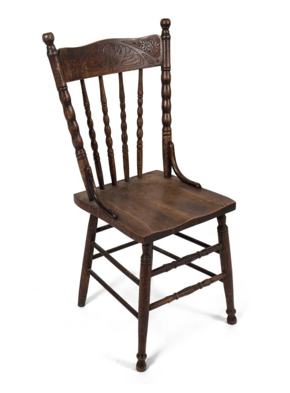 An antique Australian blackwood and kauri pine chair with waratah and flannel flower back, 19th20th century