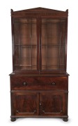 An antique English mahogany secretaire bookcase with astragal glazed doors and paladian top, early to mid 19th century. Note: Missing shelves and glass damaged. 238cm high, 126cm wide, 59cm deep