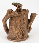 WILLIAM RICKETTS rare Australian pottery tree trunk teapot, adorned with gumnuts, leaves and king parrot finial glazed with green and red, incised "Wm. Ricketts, Melbourne, 1934". This piece was one of a series of teapots Ricketts made for the Melbourne C - 3