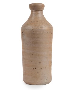 A stoneware ginger beer bottle, made in Sydney by Jonathan LEAK at his Brickfield Hill pottery in the 1820s. It is a rare example of the earliest surviving marked pottery made in Australia, impressed stamp "LEAK" to shoulder, 18cm high.