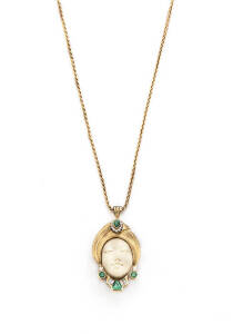 IVORY PENDANT:18ct yellow gold, ivory, diamond and emerald pendant on 9ct chain. Designed by Ross Allen, Melbourne.