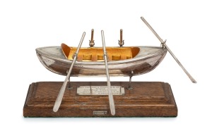 PORT JACKSON & MANLY INTEREST, Australian silver surf boat trophy, mounted on oak plinth, bearing silver plaque inscribed "Port Jackson & Manly S.S. Co. Ltd. Trophy Surf Boat Competition, Won By Cronulla S.L.S.C., 1936-37. R. MICHAELIS", also bearing additional silver plaque "ANGUS & COOTE, SYDNEY", 7cm high, 15cm wide overall