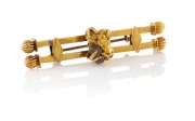 LEVINSON of Perth, Western Australia, 15ct gold miner's double bar brooch, set with natural gold nugget mineral specimen, late 19th century, stamped "LEVINSON, PERTH 15ct", 5cm wide, 7.2 grams