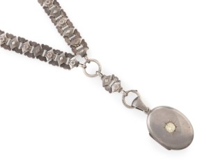 Antique Australian silver locket and ornate chain, 19th century, stamped in several places "STG. SILVER", 74 grams total 