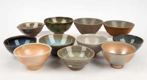 Eleven assorted Australian studio pottery tea bowls, including HAROLD HUGHAN, the largest 8cm high