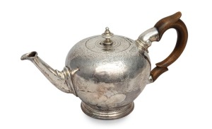 GUILLAUME HENRY George I rare CHANNEL ISLANDS silver bullet teapot with engraved decoration and deer crest, circa 1730, 12cm high, 22cm wide, 420 grams including handle
