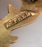 A.I.F. WW1 period 9ct rose gold brooch depicting a Vickers machine gun flanked by the Australian and British flags, engraved "M.C.S. A.I.F.", rare. Stamped "ALFRED, 9ct", ​​​​​​​3.5cm wide, 2.5 grams - 2