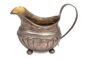 ALEXANDER DICK rare Colonial Australian silver cream jug, circa 1830, stamped "A.D. N.S.W." with anchor and castle, 10.5cm high, 14cm wide, 154 grams. Provenance: Shapiro Auctions, Fine Silver, Jewellery & Luxury Design, 16 June 2014, Lot 747.