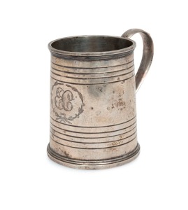 ALEXANDER DICK Colonial Australian silver christening mug, with engraved circular banding to the body, a round barbed handle, sitting on a collet foot base, with engraved monogram "E.C.", circa 1835, stamped "A.D.", 8.5cm high, 222 grams.