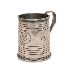 ALEXANDER DICK Colonial Australian silver christening mug, with engraved circular banding to the body, a round barbed handle, sitting on a collet foot base, with engraved monogram "E.C.", circa 1835, stamped "A.D.", 8.5cm high, 222 grams.