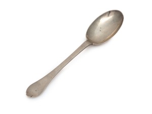 An 18th century CHANNEL ISLANDS silver trefid spoon by THOMAS MAUGER of Jersey, circa 1735, engraved "E.L.B. A.L.C.", 18cm long, 34 grams
