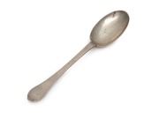 An 18th century CHANNEL ISLANDS silver trefid spoon by THOMAS MAUGER of Jersey, circa 1735, engraved "E.L.B. A.L.C.", 18cm long, 34 grams