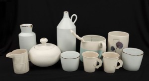 Ten pieces of contemporary Australian studio ceramics, mostly in cream and white, ​​​​​​​the largest 22cm high