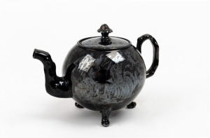 JACKFIELD type rare 18th century lustre glazed teapot, circa 1755, 11cm high, 15.5cm wide