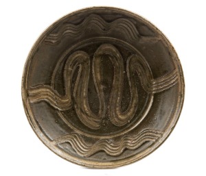 MICHAEL CARDEW, English glazed earthenware charger, circa 1975, impressed marks to base, 34cm diameter