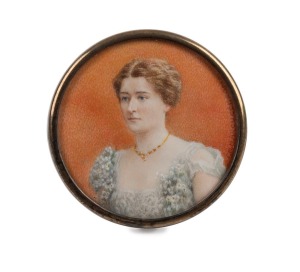 An antique circular hand-painted miniature portrait of a lady, signed "F.M. MARCUCCI. ROMA", housed in a silver frame, 19th century, ​​​​​​​5.5cm diameter