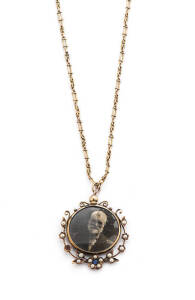 PENDANT: Edwardian 9ct gold pendant and chain. 10.94 grams.