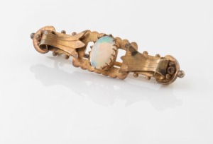 HINDLESTONE & SAUNDERS of Melbourne, antique 15ct gold bar brooch, set a solid opal, 19th century, stamped "15" flanked by pictorial marks, 4.5cm wide, 3.6 grams