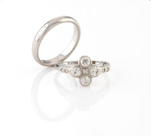 A vintage 18ct white gold and platinum ring, set with brilliant cut white diamonds; together with a platinum wedding band, circa 1930s, (2 items), ​​​​​​​6.4 grams total