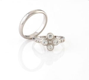 A vintage 18ct white gold and platinum ring, set with brilliant cut white diamonds; together with a platinum wedding band, circa 1930s, (2 items), 6.4 grams total