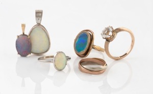 A 9ct gold mounted opal doublet pendant, a sterling silver mounted solid opal pendant, a 9ct gold Russian wedding ring, a 9ct rose gold and white paste ring stamped "W. KERR", a 9ct gold and opal doublet ring, and a silver and opal ring, 20th century, (6 items)