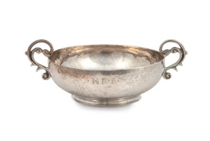 An 18th century CHANNEL ISLANDS silver christening cup in the Jersey style by GUILLAUME HENRY of Guernsey, circa 1750, engraved "N.R.B.", 4.5cm high, 13cm wide, 92 grams