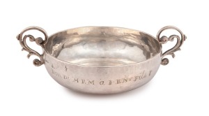 An 18th century CHANNEL ISLANDS silver christening cup by ROBERT De BARBEDOR of Jersey, circa 1700, engraved "K.L.C." and with additional inscription on reverse, 4cm high, 13cm wide, 80 grams