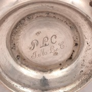 An 18th century CHANNEL ISLANDS silver porringer or loving cup by THOMAS DAVID MAUGER of Jersey, circa 1750, with "TM" mark and engraved with ownership initials to base, 12cm high, 18cm wide, 420 grams - 2