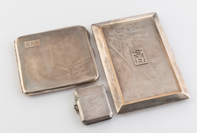 HARDY BROS. Australian silver cigarette case with gold highlights; an Australian silver cigarette case, plus an Australian silver vesta case, 20th century, (3 items), the largest 12.5cm wide, 315 grams total