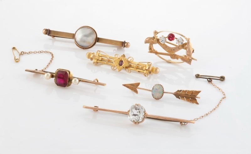 Six antique Australian 9ct and 15ct gold brooches, makers include JOHN McBEAN and CARIS Ltd., 19th/20th century, ​​​​​​​the largest 6.5cm wide, 23.2 grams total