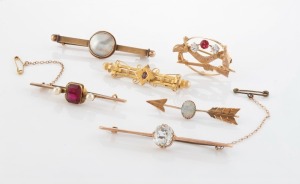 Six antique Australian 9ct and 15ct gold brooches, makers include JOHN McBEAN and CARIS Ltd., 19th/20th century, the largest 6.5cm wide, 23.2 grams total