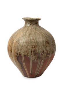 PETER RUSHWORTH stoneware vase with green and gold drip glaze, impressed artist's seal to base, 31cm high